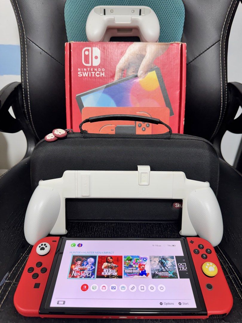Nintendo Switch OLED (Category: Nintendo) located in Navotas City. Submitted by emembravocastillo (Listing ID 1468718952, Image 2). Description: (PRE-OWNED NINTENDO SWITCH OLED MARIO RED EDITION JB 256 GB) 13,000 fixed price and last price posted na din po yan. With many games ready to play na din po gagamitin nalang. With complete accessories DOCK, HDMI CORD, STRAPS, GRIP, BOX. With freebies SKULL&CO. POUCH, EXTRA GRIP, ANALOG CAPS, NAKA TEMPERE