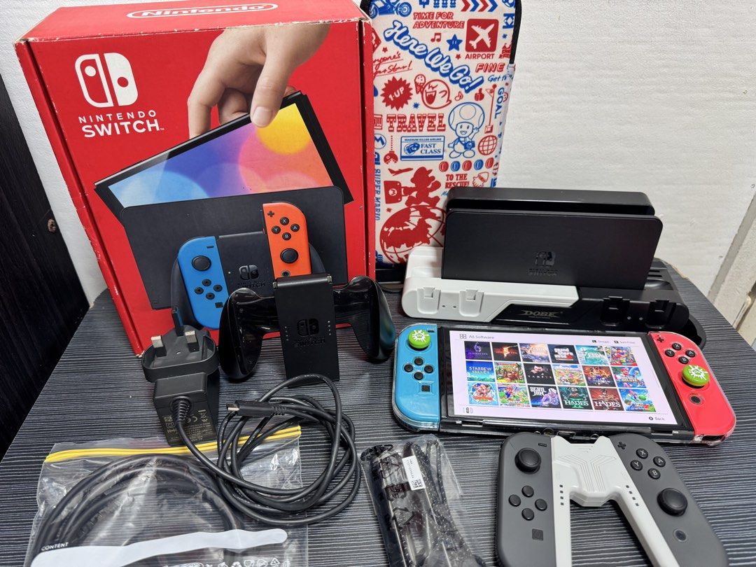 Nintendo Switch OLED (Category: Nintendo) located in Navotas City. Submitted by animatorside (Listing ID 1468754954, Image 1). Description: SECOND HAND NINTENDO SWITCH OLED JB 512 GB. 16,000 LAST PRICE. No hidden issues. Full of games ready to play na po gagamitin nalang. Paki check nalang po sa pictures yung mga games. Complete accessories DOCK, HDMI CABLE, GRIP, STRAPS, BOX. With free Dobe charging dock, free 1 extra original Joy-Con, free 1 ex