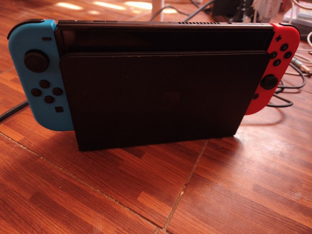 Nintendo Switch OLED (Category: Nintendo) located in Pasay City. Submitted by cnm.0728 (Listing ID 1468809751, Image 1). Description: Nintendo Switch OLED with Pokémon ZA and Arceus, Overcooked All You Can Eat, Mario Cart 8 Deluxe and Nintendo Sports.