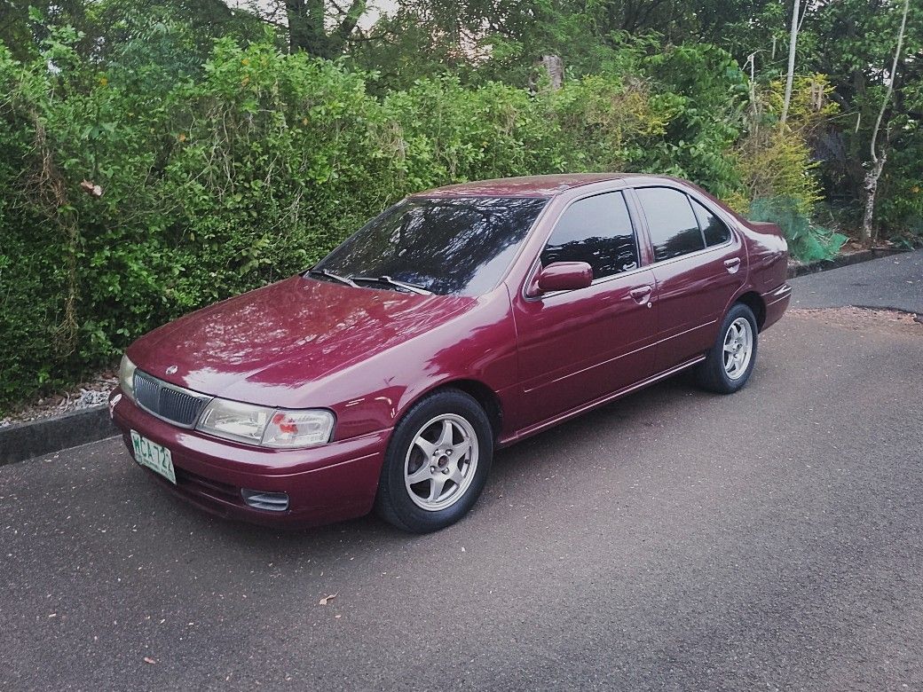 Nissan sentra B14 Auto (Category: Used Cars) located in Rizal. Submitted by tracertype (Listing ID 1468808568, Image 2). Description: rush sale! 1998 Nissan Sentra B14 excellent condition all original new battery w/ warranty cold ac complete orig docs registered till 2027.