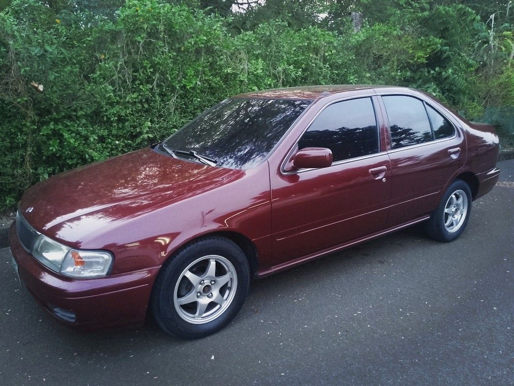 Nissan sentra B14 Auto (Category: Used Cars) located in Rizal. Submitted by tracertype (Listing ID 1468808568, Image 1). Description: rush sale! 1998 Nissan Sentra B14 excellent condition all original new battery w/ warranty cold ac complete orig docs registered till 2027.