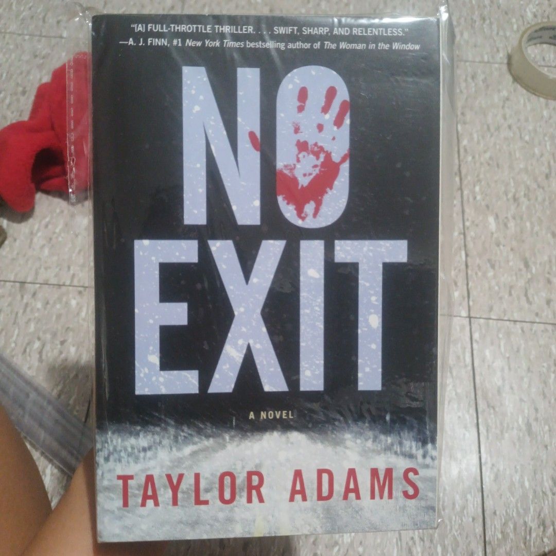 No Exit by Taylor Adams Novel (Category: Storybooks) located in Taguig. Submitted by verz018 (Listing ID 1468893922, Image 1). Description: - Title: No Exit by Taylor Adams - Format: Paperback with striking bloody handprint cover - Plot: College student Darby Thorne is trapped in a blizzard at a rest stop and discovers a kidnapped child - Condition: Very minor shelf wear on spine and corners from storage - Pages: Clean and unmarked inside - Perfe
