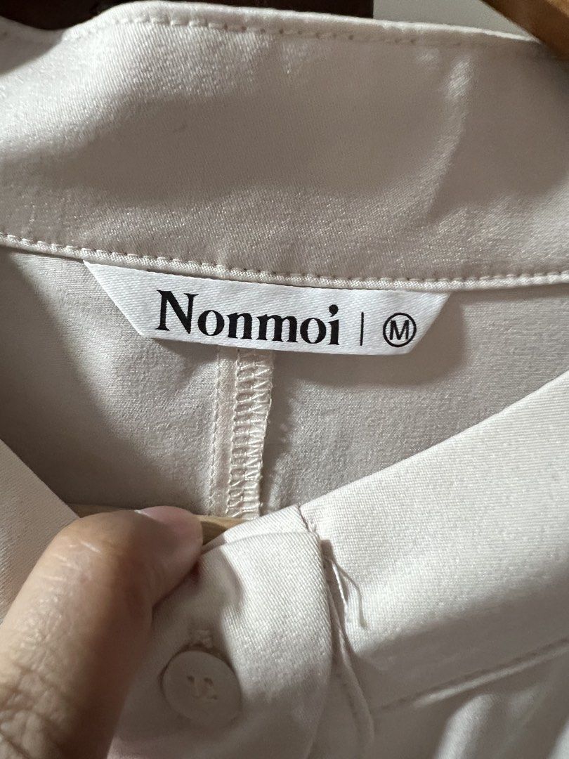 Nonmoi Cream Button-Up Blouse Size M (Category: Blouses) located in Quezon City. Submitted by sell4less123 (Listing ID 1468752948, Image 2). Description: Worn once/no issues - Brand: Nonmoi - Size: Medium (tag inside collar) - Color: Neutral cream (goes with everything) - Style: Mandarin collar, front button closure, half sleeves with gathers, paneled chest and shoulder seams - Versatility: Perfect for workwear or casual weekends Strictly payment