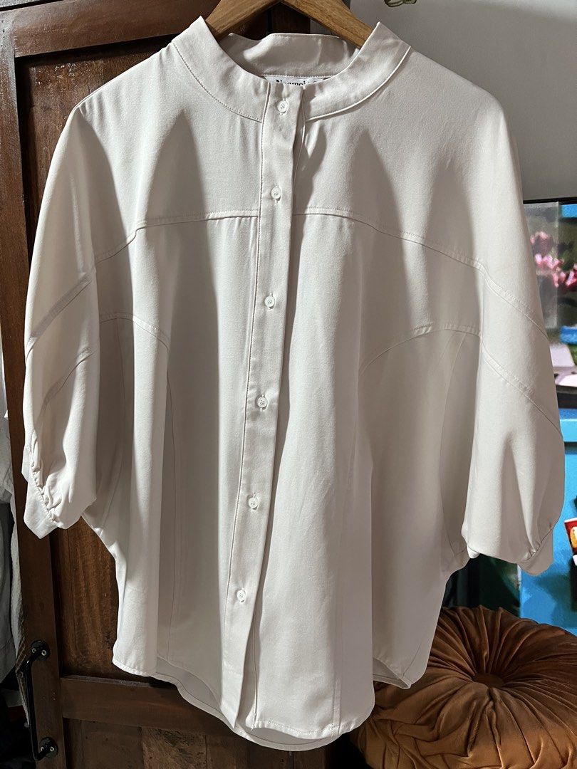 Nonmoi Cream Button-Up Blouse Size M (Category: Blouses) located in Quezon City. Submitted by sell4less123 (Listing ID 1468752948, Image 1). Description: Worn once/no issues - Brand: Nonmoi - Size: Medium (tag inside collar) - Color: Neutral cream (goes with everything) - Style: Mandarin collar, front button closure, half sleeves with gathers, paneled chest and shoulder seams - Versatility: Perfect for workwear or casual weekends Strictly payment