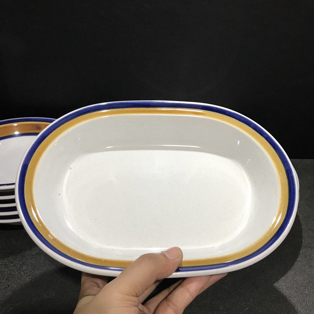 Noritake Primastone Pacifica 8307 Dinnerware Set (Category: Dinnerware & Cutlery) located in Baao. Submitted by all.things.japan (Listing ID 1468742656, Image 3). Description: Dinner Plate: 10.5 inches Bowls: 7.5 x 1.75 inches Server: 9.5 x 7 x 1.75 - Brand: Noritake Primastone - Pattern: Pacifica (8307) - Origin: Made in Japan - Material: Genuine sturdy stoneware - Design: Speckled white background with blue and ochre bands - Set Includes: Plate
