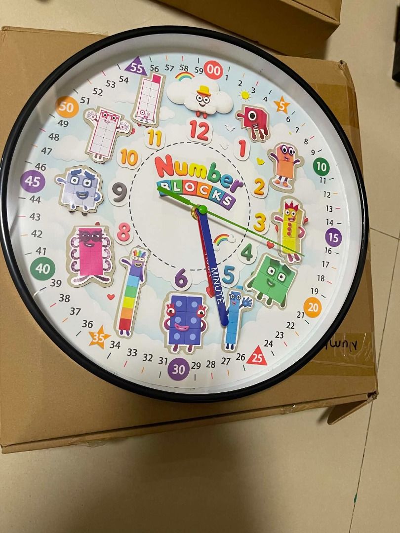Numberblocks wall clock 12" (Category: Clocks) located in Santa Rosa. Submitted by aos-ph (Listing ID 1468803309, Image 2). Description: - 12-inch size, ideal for bedrooms, playrooms, or classrooms - Features colorful and popular Numberblocks characters to engage kids - Clear number markings designed to help children learn how to tell time - Fun and educational addition to any child's room decor - Brand new and ready to hang.