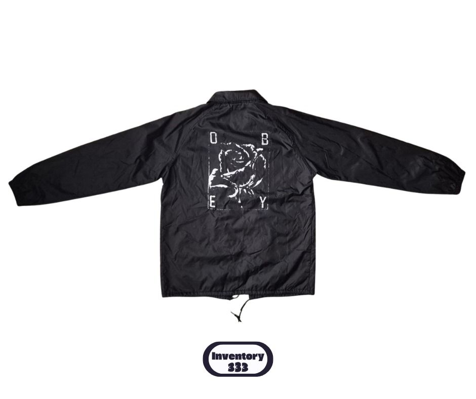 Obey Black Coach Jacket with Rose Print (Category: Coats, Jackets and Outerwear) located in Taguig. Submitted by regimennn (Listing ID 1468831857, Image 2). Description: - Brand: Obey - Material: Durable black nylon Disintegrated Rose Print front and Back. Buttons, Strings in good condition.