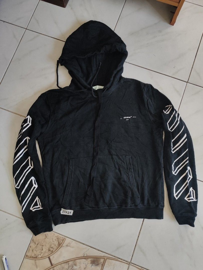 Off-White Black Marker Arrows Hoodie (Category: Coats, Jackets and Outerwear) located in Tuguegarao City. Submitted by johnpetera0818 (Listing ID 1468901730, Image 2). Description: - Authentic Off-White hoodie in classic black - Iconic marker graphics on the back and sleeves -issue minimal hairline cracks - Subtle Off-White logo print on the chest - Practical kangaroo pocket and adjustable drawstring hood - Premium 100% cotton, made in Portugal -