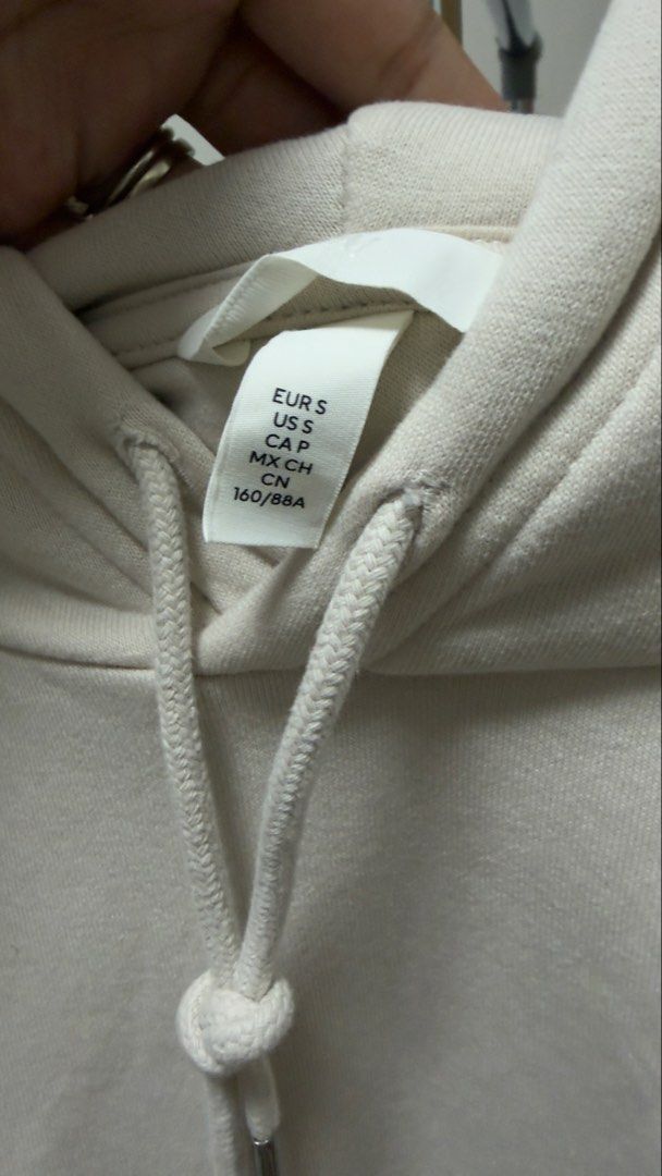 Off-white Hoodie Sweatshirt Size S (Category: Coats, Jackets and Outerwear) located in Manila. Submitted by rare_closetcleanout (Listing ID 1468799602, Image 3). Description: - Color: Off-white - Size: S (EUR/US S, 160/88A) - Fit: Relaxed and super comfortable - Features: Front kangaroo pocket, adjustable drawstring hood - Details: Ribbed cuffs and hem to lock in warmth - Condition: Clean, well-maintained Lose type (Fits S-L) Decluttering Pls arr