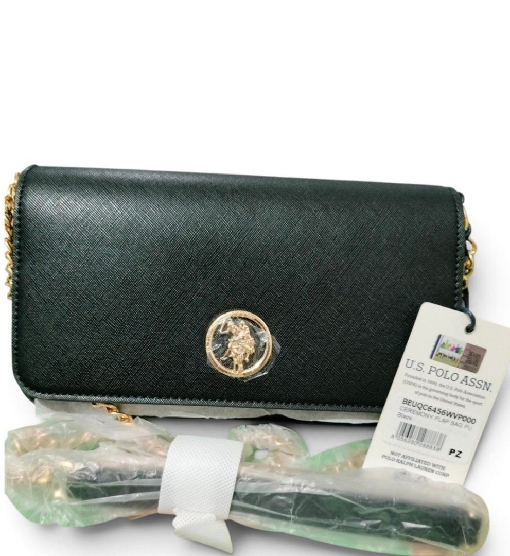 OG USPA Black Flap Bag (Category: Cross-body Bags) located in Caloocan City. Submitted by almaeternamara (Listing ID 1468923328, Image 2). Description: Women's crossbody bag in blue color, made of high-quality eco-friendly leather. Internally, it is made of fabric lining and its storage space consists of two parts. It features an internal pocket with a zipper. Gold metal detail on the front with the US Polo Assn. logo. Secure closure with a magne