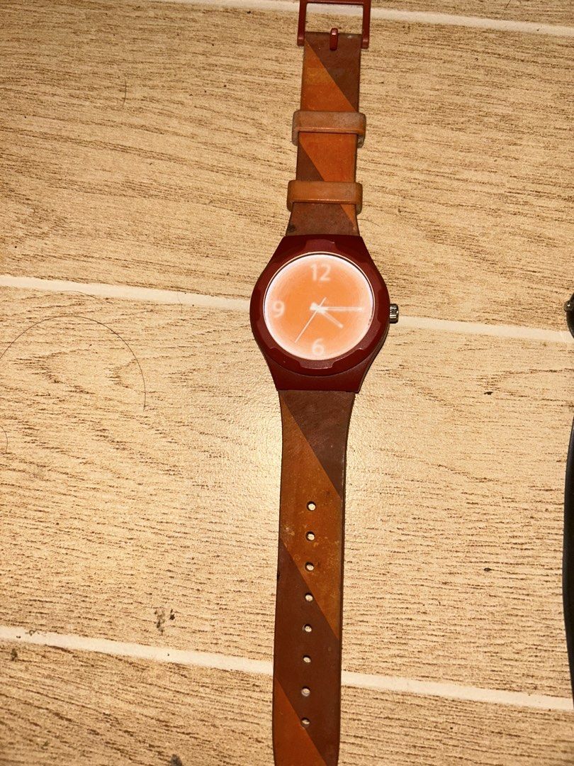 Old Analog Wristwatches (Category: Women's Watches) located in Manila. Submitted by _zzaney (Listing ID 1468849524, Image 3). Description: - old analog watches - Watch 1: Jack Spade with orange face and red/brown patterned strap. Issue: foggy glass - Watch 2: Casio. Black. Missing other half strap - Watch 3: Casio with classic gold-tone case and brown leather strap. Strap is was replaced - Condition: heavily used. - Great bundle deal for watch co