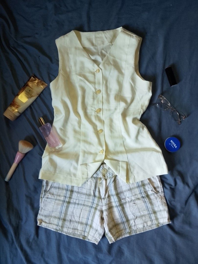 Old money vest cream (Category: Sleeveless) located in Adams. Submitted by yelri555 (Listing ID 1468713739, Image 2). Description: Old Money Vest + Plaid Shorts Coord (can and cannot be included depends on the buyer's term.) - Cream White - Sleeveless V-neck vest, 5 buttons, cream - High-waist plaid shorts, white with sage/blue lines - Size: S-M - Fabric: Light & breathable - Condition: Good, no flaws Accessories not included..