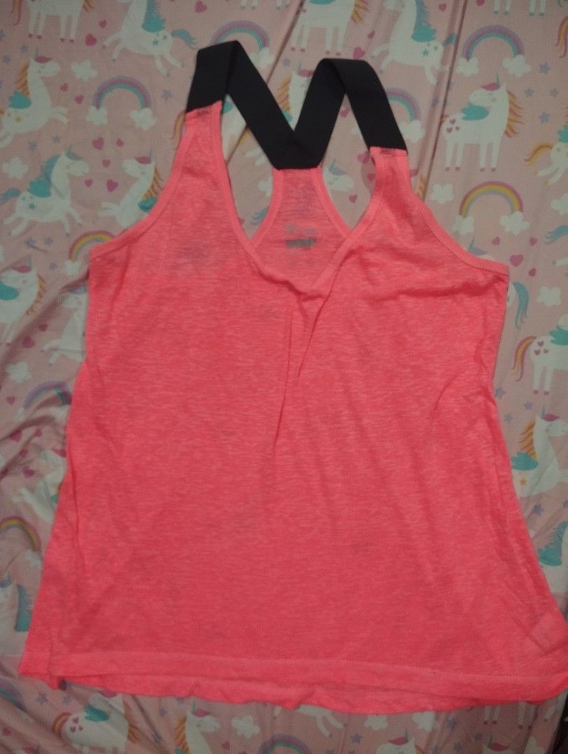 Old Navy Active Pink Tank Top Size L (Category: Sleeveless) located in Dagupan City. Submitted by nahamul_1508 (Listing ID 1468902269, Image 1). Description: Preloved - Brand: Old Navy Active - Color: Neon pink with black straps - Size: Large (printed inside neckline) - Design: Racerback with thick black cross straps at the back - Material: Lightweight with a slight heathered look - Condition/Use: Great for workouts, gym sessions, or casual wear 