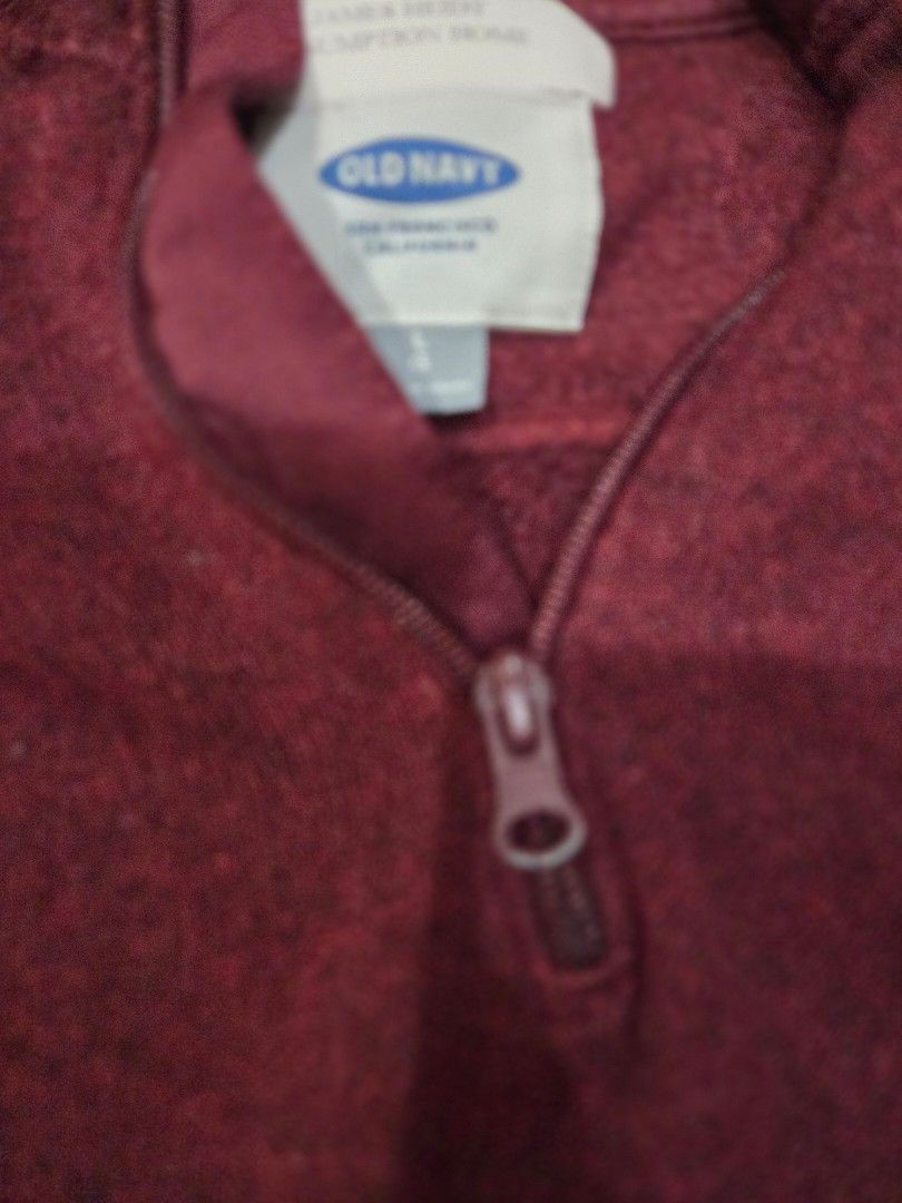 Old Navy Maroon Quarter Zip Sweater (Category: Coats, Jackets and Outerwear) located in Taguig. Submitted by mon_143 (Listing ID 1468898316, Image 2). Description: - Brand: Old Navy - Color: Maroon - Size: L - Material: Textured knit with soft fleece lining - Features: Quarter-zip high collar, long sleeves, ribbed cuffs and hem - Condition: Great for cooler weather, warm and cozy pullover.