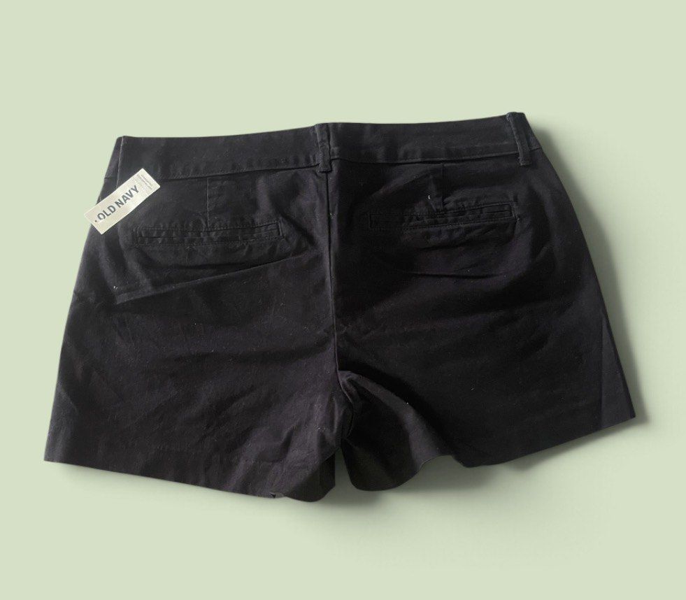 Old Navy Pixie Mid-Rise Black Shorts - Authentic (Category: Shorts) located in San Pedro. Submitted by lifebeginsaftercoff33 (Listing ID 1468742393, Image 3). Description: - Brand: Old Navy (Pixie) - Color: Solid Black - Condition: Brand new with original tags attached - Rise: Mid-rise with hook-and-bar closure and zip fly - Inseam: 3.5 inches - Pockets: Two functional back pockets - Very soft comfy stretchy fabric w/ loop belt - Dimes: 32 x 12 i