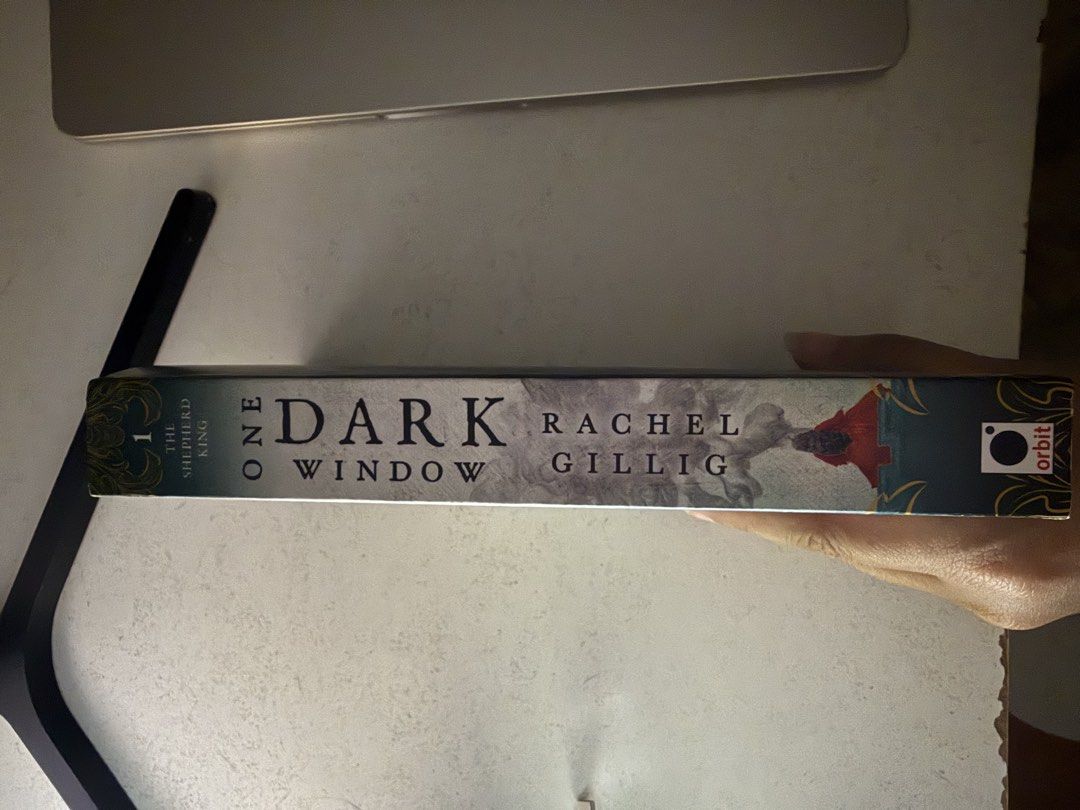 One Dark Window by Rachel Gillig (Category: Storybooks) located in Zamboanga. Submitted by nini_0423 (Listing ID 1468860010, Image 2). Description: - Title: One Dark Window (The Shepherd King Series #1) - Author: Rachel Gillig - Publisher: Orbit (Paperback) - Condition: Excellent / Like New (Read once, kept on shelf) - Details: Clean pages, intact spine, zero creases.
