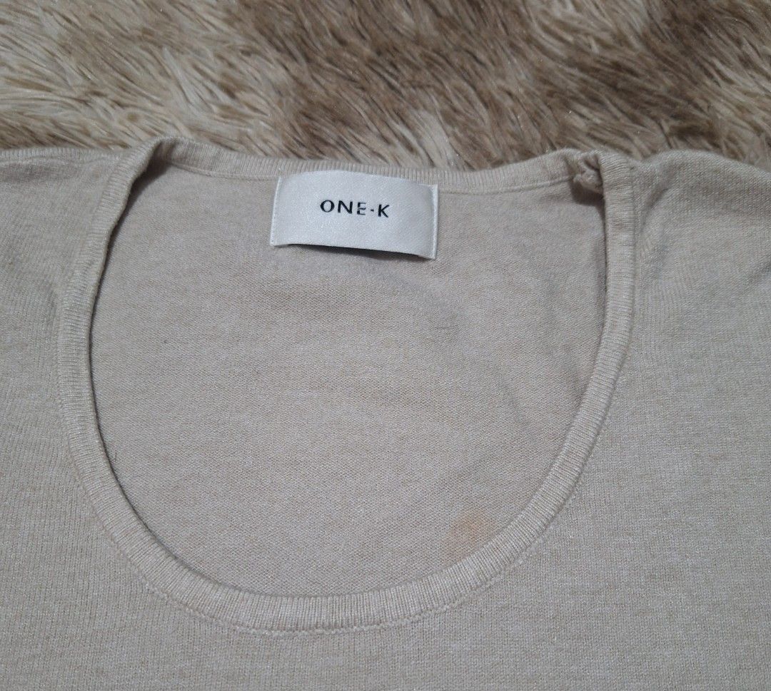 One K Knit Top (Category: Sleeveless) located in Quezon City. Submitted by ilovebigbrands (Listing ID 1468744907, Image 3). Description: Used twice. Can fit small(loose fitting) to large frame. High quality material. With signs of usage. (See last photo).