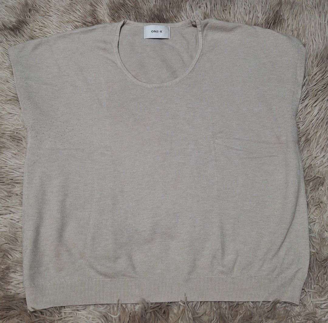 One K Knit Top (Category: Sleeveless) located in Quezon City. Submitted by ilovebigbrands (Listing ID 1468744907, Image 1). Description: Used twice. Can fit small(loose fitting) to large frame. High quality material. With signs of usage. (See last photo).