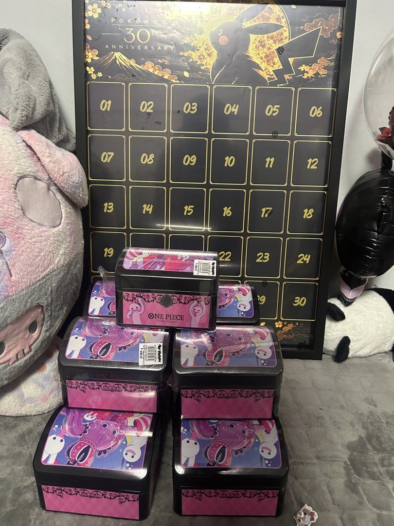 One Piece Card Game Treasure Chest Storage Box (Category: Card Boxes & Cases) located in Makati City. Submitted by garyson4321295 (Listing ID 1468732973, Image 1). Description: - Official One Piece Card Game treasure chest storage boxes - Color: Black and pink with character art graphic print on top lid - Solid and sturdy construction, perfect for card collections or general display - Stackable design to save space (multiple units available) - Br