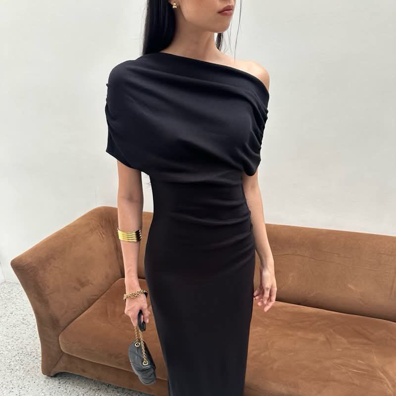 One shoulder black Ribbed Midi Dress (Category: Dresses) located in Caloocan City. Submitted by ginnypygmypuff (Listing ID 1468809484, Image 1). Description: - Brand: Rooha - Style: Black ribbed midi dress with short sleeves and a cowl/boat neckline - Material: Soft, stretchy fabric that hugs the body - Condition: Worn a few times, carefully washed and stored - Versatility: Great basic piece for casual outings or layering.