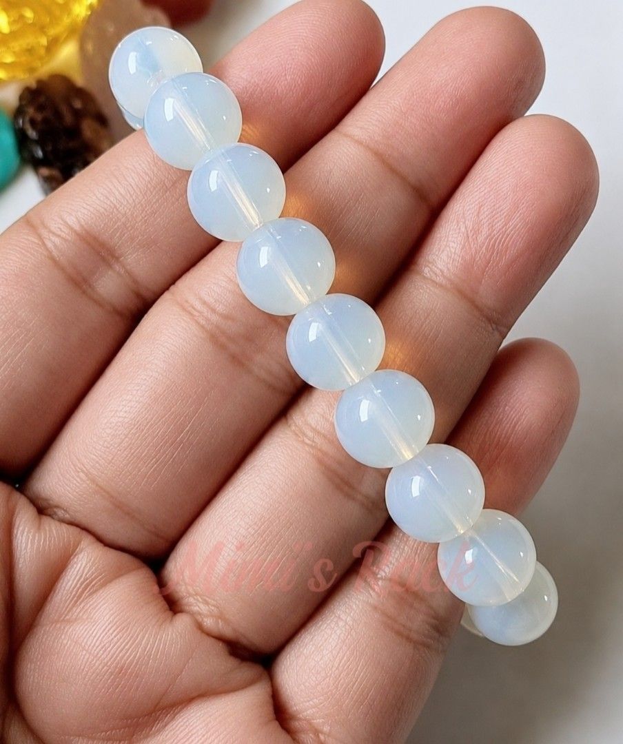 Opalite Bracelet | Soft Glow Bracelet (Category: Bracelets) located in Taguig. Submitted by mimisrack (Listing ID 1468912985, Image 2). Description: 🤍Dreamy shine with gentle elegance. -Opalite beads with milky glow -Smooth polished finish -Lightweight and comfortable for everyday wear -Opalite is associated with calmness, clarity, and emotional balance -A delicate bracelet that adds a soft, luminous touch to your look 🧿 Bead size: 10mm 💎Gems 