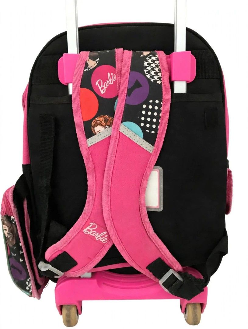 Original Barbie Trolley Bag School Backpack (Category: Backpacks) located in Las Pinas. Submitted by rejanesandro1981 (Listing ID 1468716413, Image 3). Description: - Authentic Barbie trolley bag in pink and black - Can be used as a pull-along trolley or a regular backpack with padded straps - Features a retractable handle and smooth-rolling wheels - All zippers are fully functional and the bag is in clean condition - Ideal size for daily school 