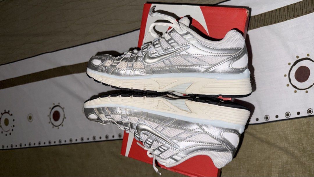 ORIGINAL NIKE P-6000 (Category: Sneakers) located in Manila. Submitted by gabbi10 (Listing ID 1468816553, Image 2). Description: FOR SALE: ORIGINAL NIKE P-6000 Selling Price: ₱5,500 only! Original Price: ₱8,000 Size: US 7 Women Condition: Slightly dirty from use. Please refer to the actual photos for the shoe’s condition. Note: The original shoe box has already been discarded, so the box in the photos is not the original box. Message me if intere