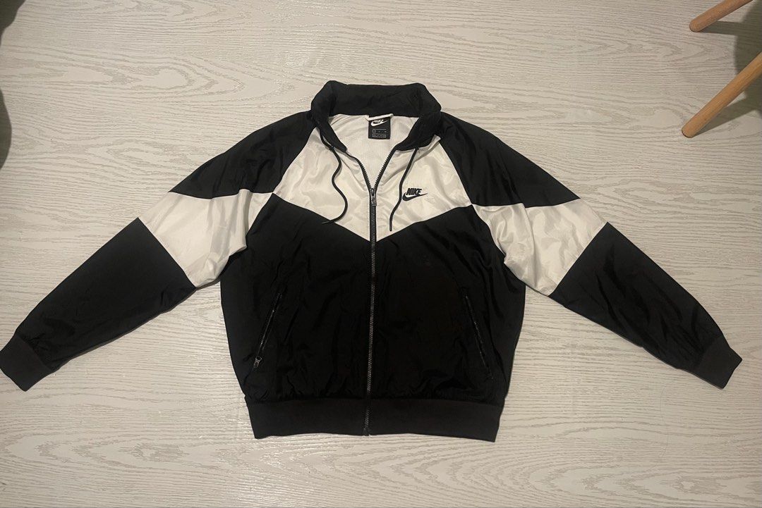 Original Nike Windbreaker Jacket (Category: Coats, Jackets and Outerwear) located in Manila. Submitted by karlthrift922 (Listing ID 1468846895, Image 2). Description: Medium size Excellent condition No issue Packable hood With big swoosh at the back.