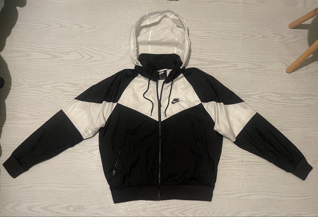 Original Nike Windbreaker Jacket (Category: Coats, Jackets and Outerwear) located in Manila. Submitted by karlthrift922 (Listing ID 1468846895, Image 3). Description: Medium size Excellent condition No issue Packable hood With big swoosh at the back.