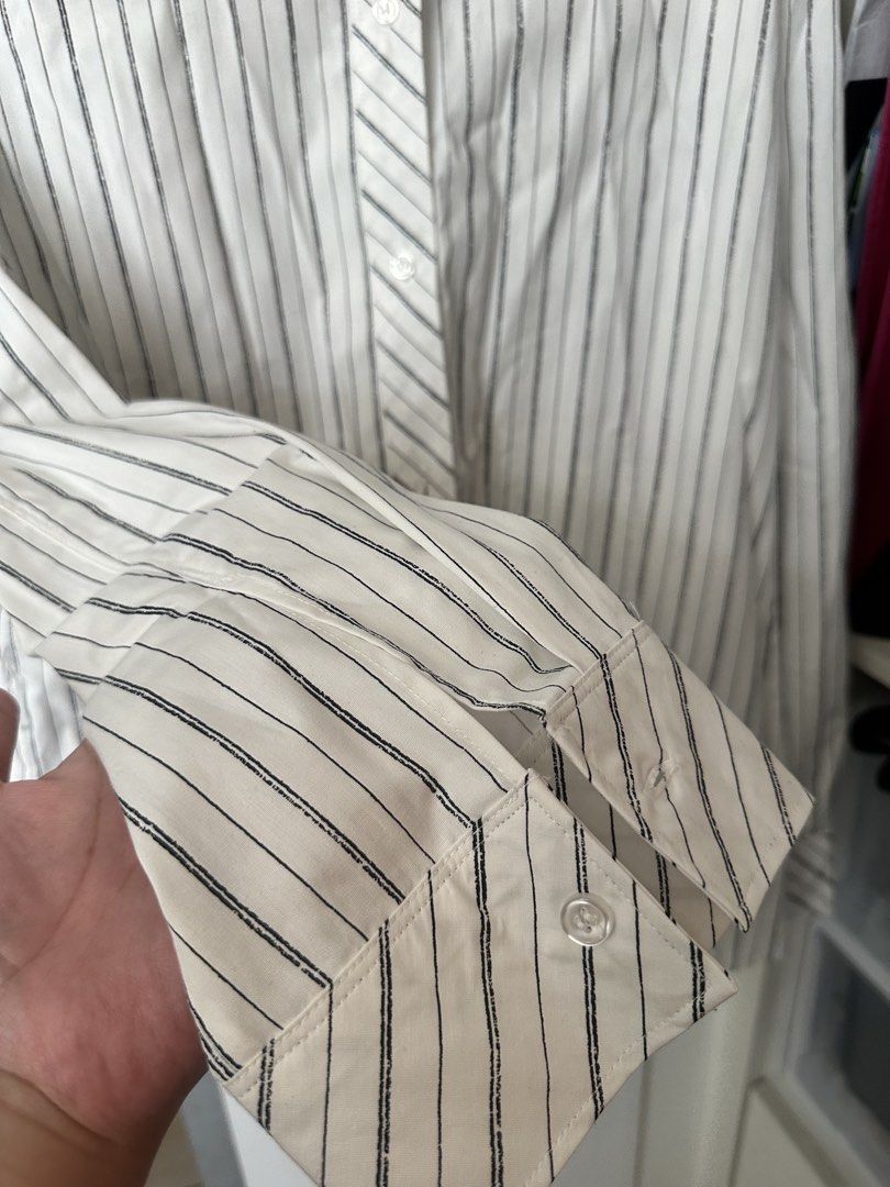 Oversized H&M Striped Long Sleeve Button-Down Shirt XL (Category: Longsleeves) located in Caloocan City. Submitted by be.iiiii (Listing ID 1468830112, Image 3). Description: Best fit 2XL up For lalamove shipping only from makati- Brand: H&M - Style: Long sleeve button-down shirt - Color: Classic white with thin black vertical stripes - Size: EUR XL / US XL (Loose, comfortable fit) - Details: Pointed collar, buttoned cuffs, and unique diagonal str