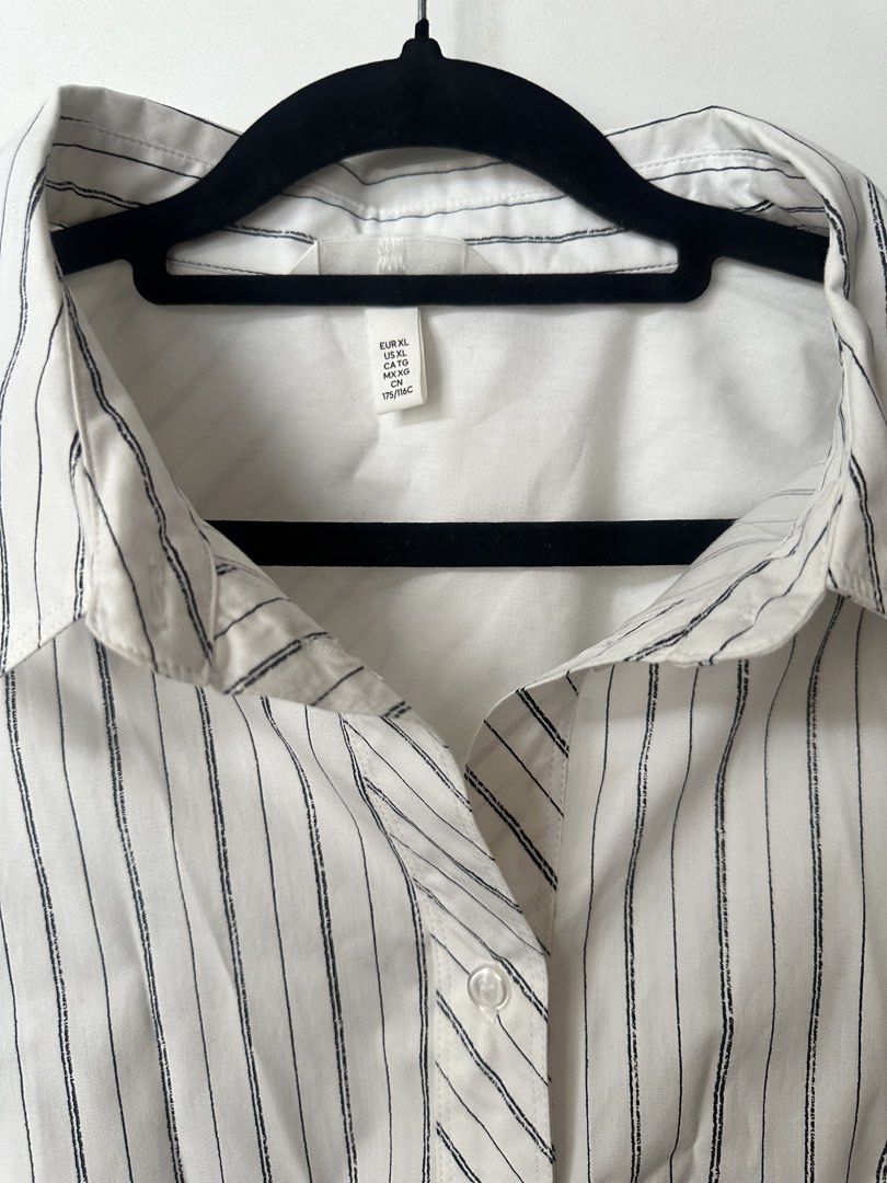 Oversized H&M Striped Long Sleeve Button-Down Shirt XL (Category: Longsleeves) located in Caloocan City. Submitted by be.iiiii (Listing ID 1468830112, Image 2). Description: Best fit 2XL up For lalamove shipping only from makati- Brand: H&M - Style: Long sleeve button-down shirt - Color: Classic white with thin black vertical stripes - Size: EUR XL / US XL (Loose, comfortable fit) - Details: Pointed collar, buttoned cuffs, and unique diagonal str