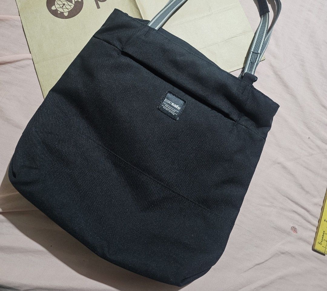 Pacsafe anti theft rfid tote bag (Category: Sling Bags) located in Manila. Submitted by onlinesmartshopping12 (Listing ID 1468843669, Image 2). Description: no issue.