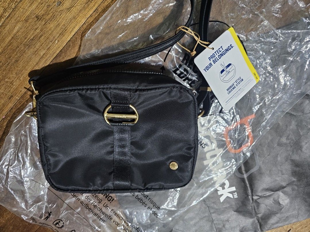 Pacsafe citysafe sling bag (Category: Cross-body Bags) located in Manila. Submitted by onlinesmartshopping12 (Listing ID 1468833941, Image 1). Description: no issue used once on an event bratpack bought.