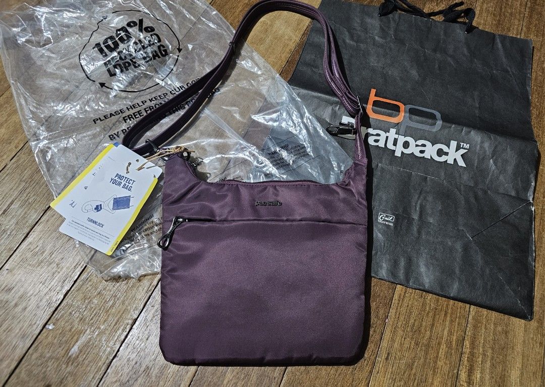Pacsafe crossbody rfid sling bag (Category: Cross-body Bags) located in Manila. Submitted by onlinesmartshopping12 (Listing ID 1468881403, Image 1). Description: purple no issue.