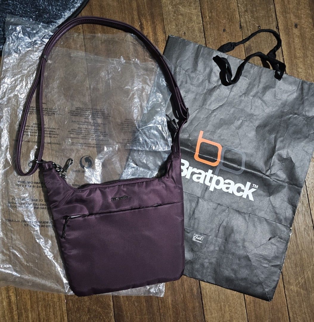 Pacsafe tote bag wallet (Category: Sling Bags) located in Manila. Submitted by onlinesmartshopping12 (Listing ID 1468834817, Image 3). Description: all original no issue denim tote 3500 black 3500 sling purple 2700 sling black 3500 wallet 2500.