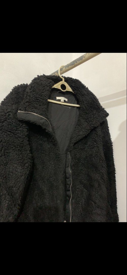 PacSun Black Sherpa Fuzzy Jacket (Category: Coats, Jackets and Outerwear) located in Manila. Submitted by spaceshop12345 (Listing ID 1468789412, Image 1). Description: - Brand: PacSun - Style: Fuzzy sherpa jacket with full zip and high collar - Color: Black - Size: XS/S - Features: Super soft, lined interior, exceptionally warm - Condition: Great outerwear piece for cold weather.
