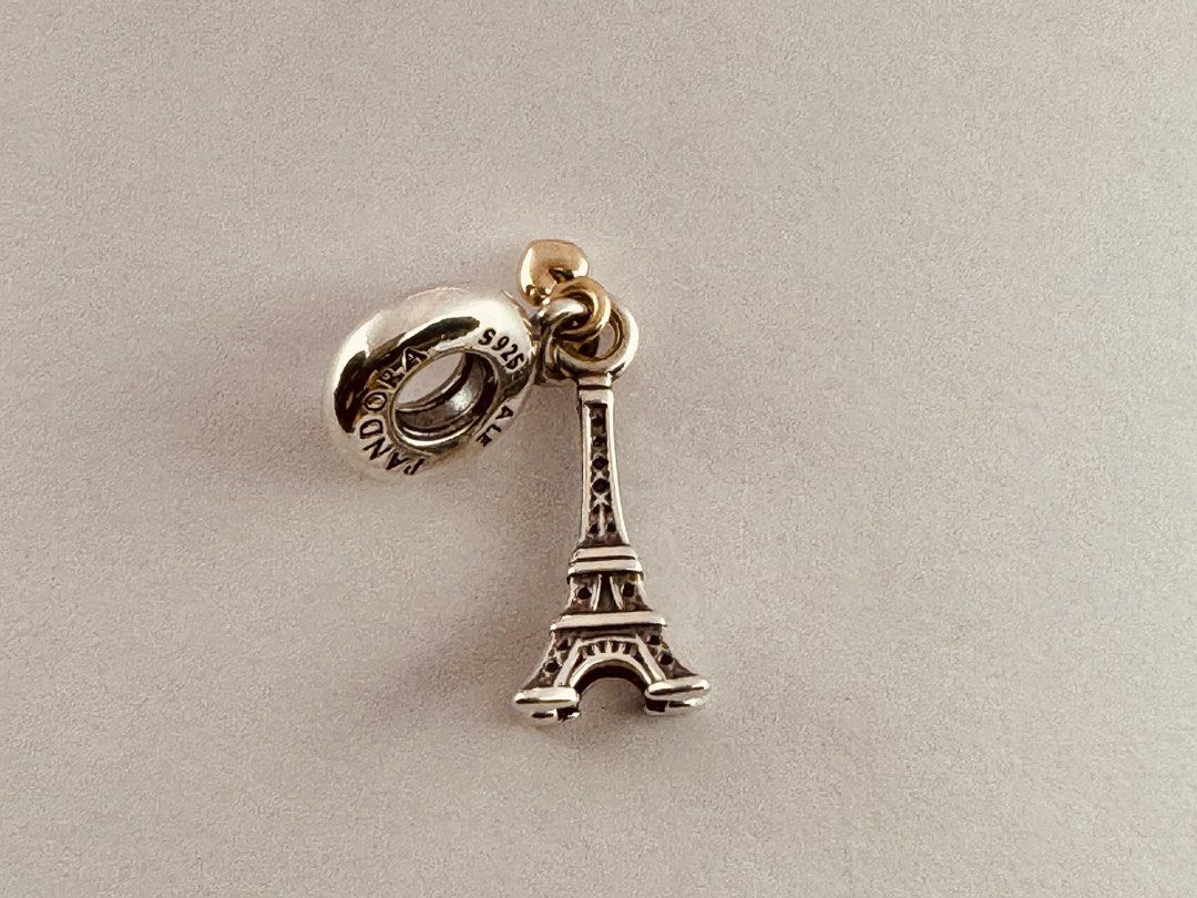 Pandora Paris Eiffel Tower Heart Dangle Charm (791302 (Category: Charms) located in Cabanatuan. Submitted by water.withahintoflime (Listing ID 1468884449, Image 3). Description: Retired|Authentic Sterling silver with 14k gold heart ❌ Issue ✅ Packaging.