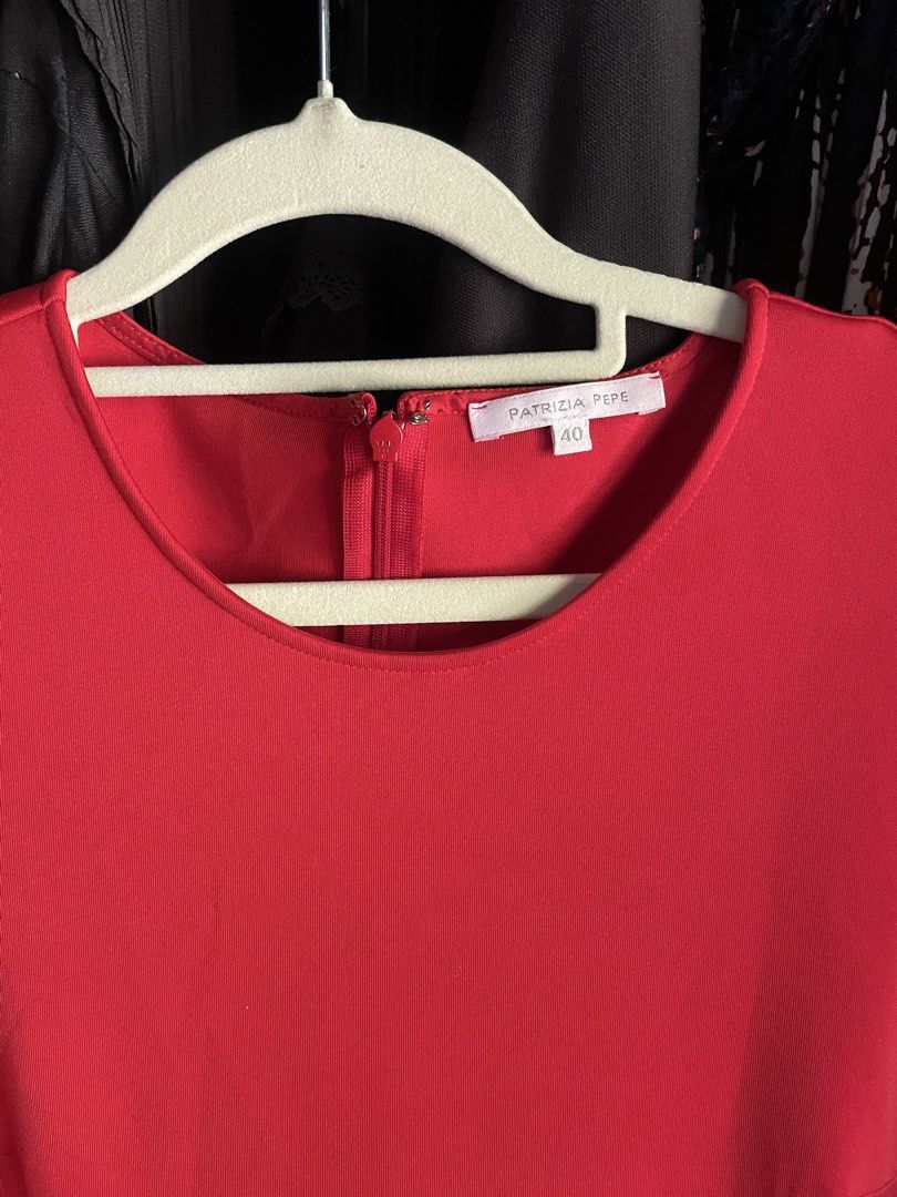 Patricia Pepe (Category: Luxury Apparel) located in Dumaguete. Submitted by jaymharr (Listing ID 1468757286, Image 2). Description: The highlighted item is a vibrant red Patrizia Pepe short-sleeve fit-and-flare skater mini dress. It features a classic round crew neckline, structured waist darts, a pleated flared skirt, and the brand’s iconic signature Fly logo charm on the left hip line..
