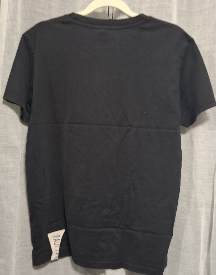 Paul Frank Graphic Tee Black Size M (Category: Tshirts & Polo Shirts ) located in Manila. Submitted by jazil.ladyliz (Listing ID 1468837260, Image 3). Description: - Brand: Paul Frank - Color: Black - Material: 100% cotton - Size: M (170/88A) - Design: Graphic print with worried monkey face and 'I'M SO NERVOUS' text - Details: Small tag label near the bottom hem on the back - Condition: Pristine, brand new with original sizing sticker still attac