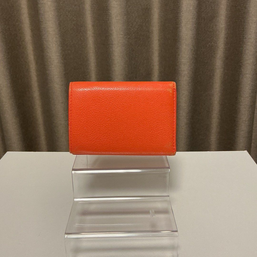 Paul Smith compact wallet (Category: Wallets & Card holders) located in Quezon City. Submitted by hintstreet (Listing ID 1468712863, Image 2). Description: Super sale na since nag fade ng konti ang gilid but hindi naman noticeable Cash and card slot is still in very good condition.