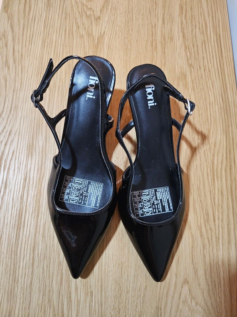 Payless Black Kitten Heels (Size 6.5) (Category: Heels) located in Quezon City. Submitted by nndvy (Listing ID 1468841768, Image 1). Description: - Brand: Fioni (bought from Payless) - Style: Black patent slingback heels with pointed toes, adjustable buckle strap, and thin kitten heels - Size: 6.5 US / 37 EUR (fits 22.5cm feet) - Condition: Like new. Used less than 5 times. Clean insoles and soles - RFS: Decluttering - MOP: Gcash, BPI, Unionbank,