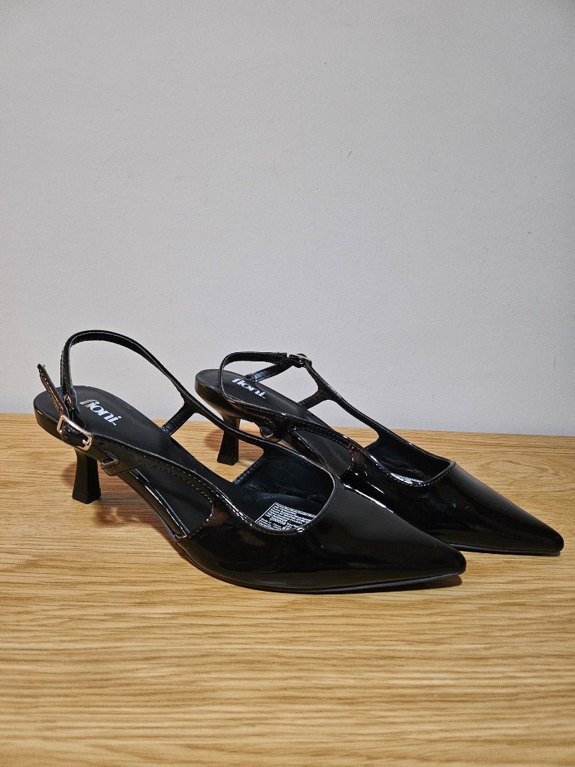Payless Black Kitten Heels (Size 6.5) (Category: Heels) located in Quezon City. Submitted by nndvy (Listing ID 1468841768, Image 2). Description: - Brand: Fioni (bought from Payless) - Style: Black patent slingback heels with pointed toes, adjustable buckle strap, and thin kitten heels - Size: 6.5 US / 37 EUR (fits 22.5cm feet) - Condition: Like new. Used less than 5 times. Clean insoles and soles - RFS: Decluttering - MOP: Gcash, BPI, Unionbank,