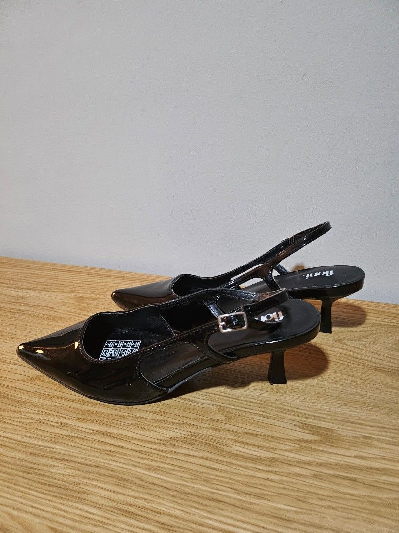 Payless Black Kitten Heels (Size 6.5) (Category: Heels) located in Quezon City. Submitted by nndvy (Listing ID 1468841768, Image 3). Description: - Brand: Fioni (bought from Payless) - Style: Black patent slingback heels with pointed toes, adjustable buckle strap, and thin kitten heels - Size: 6.5 US / 37 EUR (fits 22.5cm feet) - Condition: Like new. Used less than 5 times. Clean insoles and soles - RFS: Decluttering - MOP: Gcash, BPI, Unionbank,