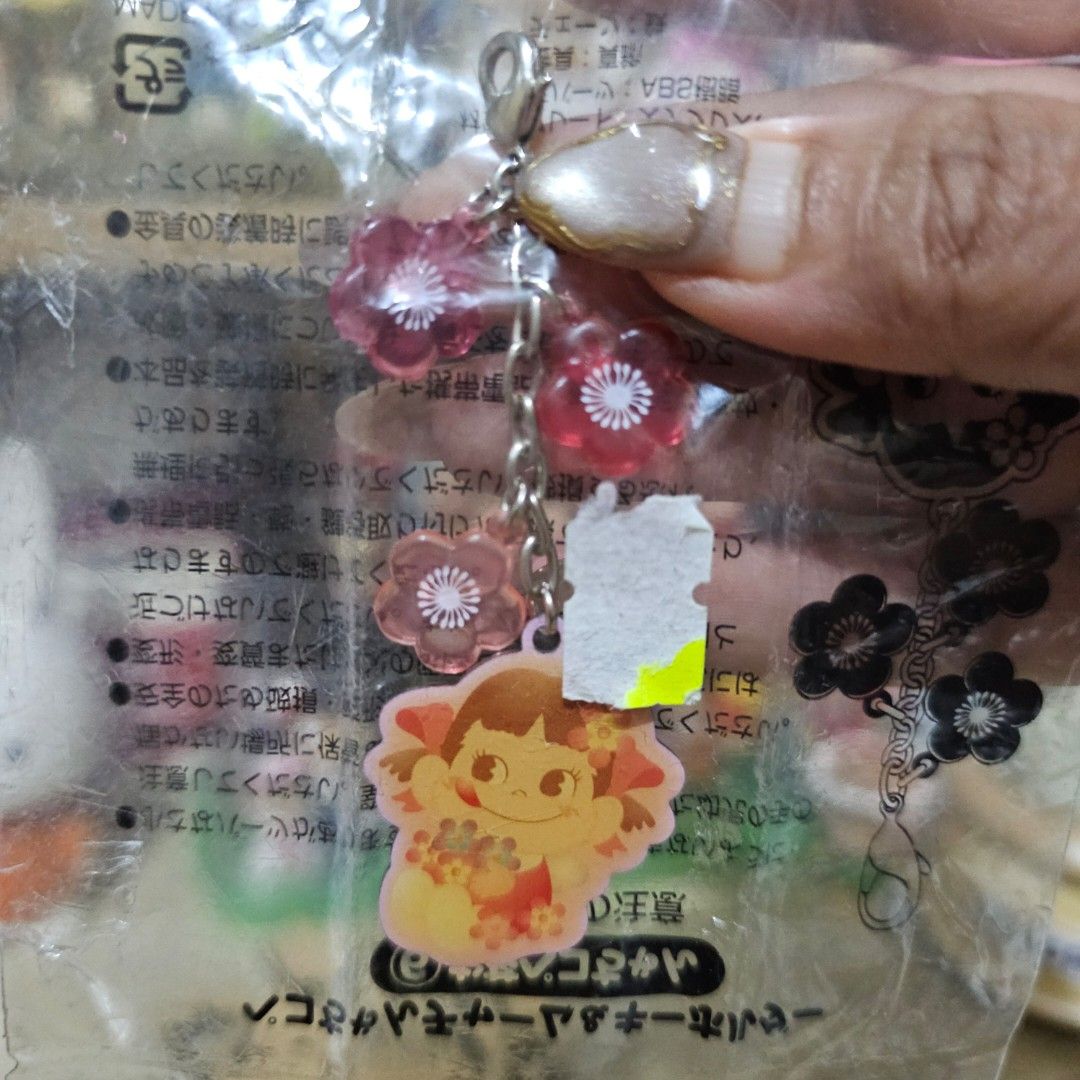 Peko-chan Flowe Charm (Category: Charms) located in Manila. Submitted by lovelylovesjapan (Listing ID 1468767384, Image 1). Description: 🌸The item is on-hand and authentic from Japan 🌸Mode of Payment (MOP): GCASH/Bank Transfer 🌸Mode of Delivery (MOD): J&T or Lalamove (Shipping every Saturdays and Sundays) Notes: 🩷Breakable items are packed with care and caution. Seller will not be held liable for any damages incurred by the courier upon deliv