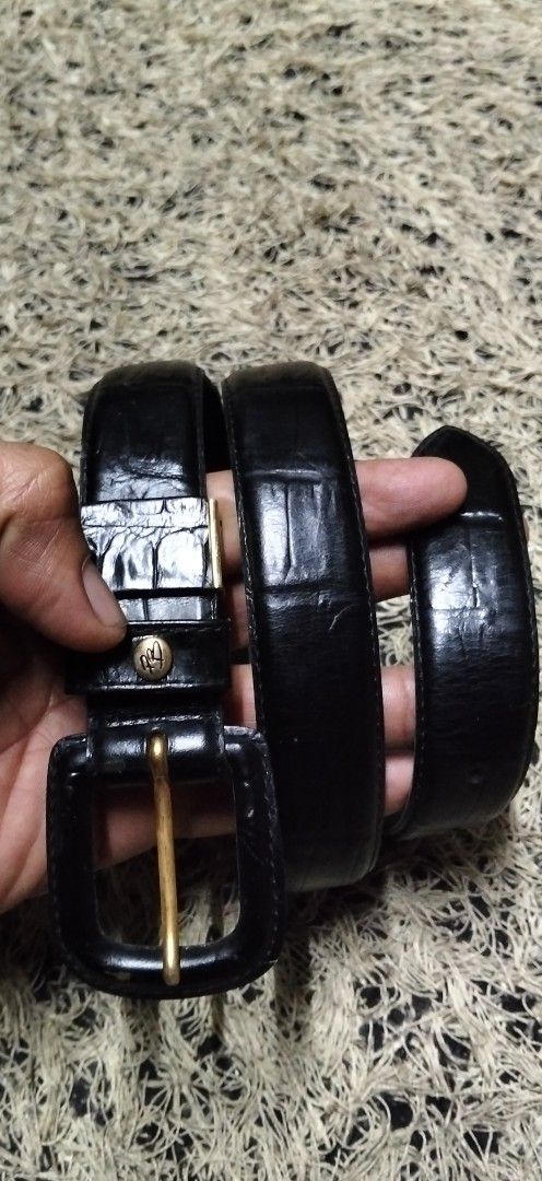 Pierre Balmain Paris Black Leather Belt (Category: Belts) located in Paranaque City. Submitted by michael-08 (Listing ID 1468925510, Image 3). Description: - Brand: Pierre Balmain Paris - Color: Classic black - Material: Premium leather with embossed texture - Hardware: Elegant gold-toned buckle and keeper loop - Details: Stamped branding visible on the inner strap - Condition: Ready for daily wear, minimal and timeless design PIERRE BALMAIN NO I