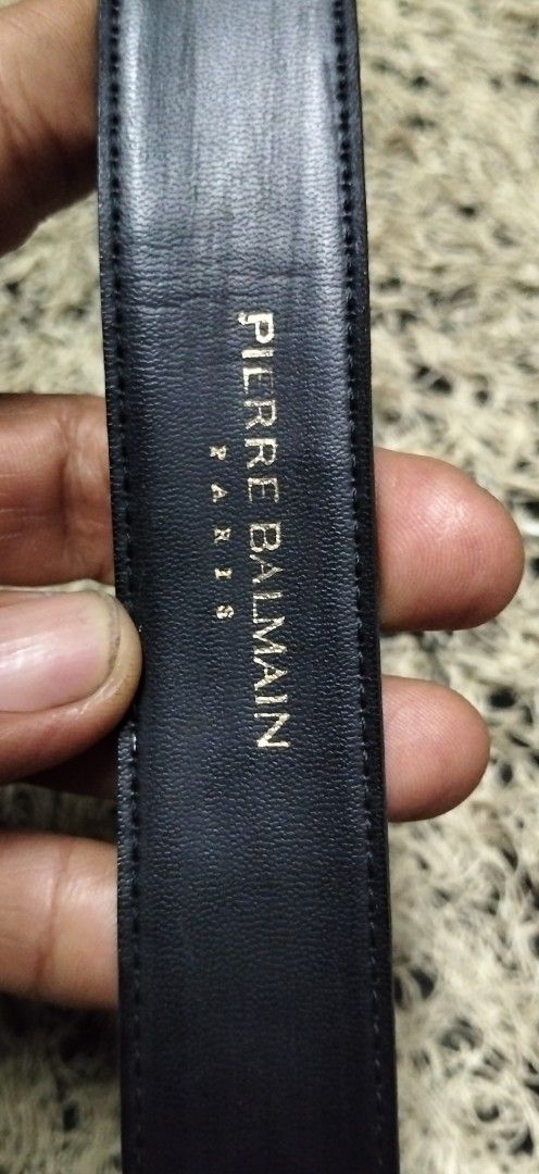 Pierre Balmain Paris Black Leather Belt (Category: Belts) located in Paranaque City. Submitted by michael-08 (Listing ID 1468925510, Image 2). Description: - Brand: Pierre Balmain Paris - Color: Classic black - Material: Premium leather with embossed texture - Hardware: Elegant gold-toned buckle and keeper loop - Details: Stamped branding visible on the inner strap - Condition: Ready for daily wear, minimal and timeless design PIERRE BALMAIN NO I