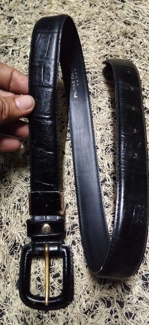 Pierre Balmain Paris Black Leather Belt (Category: Belts) located in Paranaque City. Submitted by michael-08 (Listing ID 1468925510, Image 1). Description: - Brand: Pierre Balmain Paris - Color: Classic black - Material: Premium leather with embossed texture - Hardware: Elegant gold-toned buckle and keeper loop - Details: Stamped branding visible on the inner strap - Condition: Ready for daily wear, minimal and timeless design PIERRE BALMAIN NO I