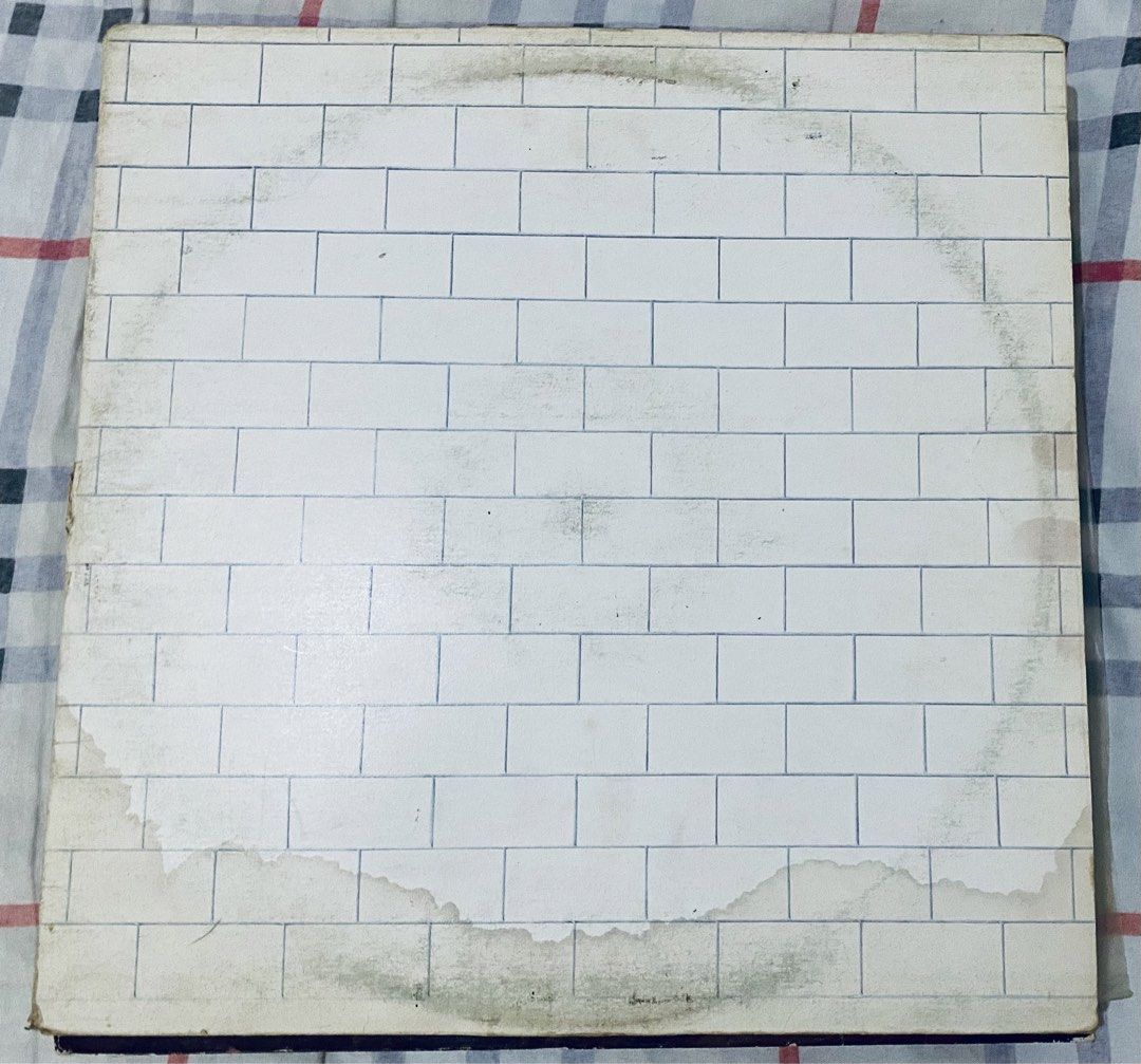 PINK FLOYD The Wall - Vinyl LP (Category: Vinyls) located in Angeles City. Submitted by lensongsong (Listing ID 1468925293, Image 1). Description: PINK FLOYD The Wall 2LP Vinyl: VG+ Cover: VG Gatefold 1979 Columbia Canada W/ lyric sheet The Wall topped the US charts for 15 weeks and reached number three in the UK. It initially received mixed reviews from critics, many of whom found it overblown and pretentious, but later received accolades as one