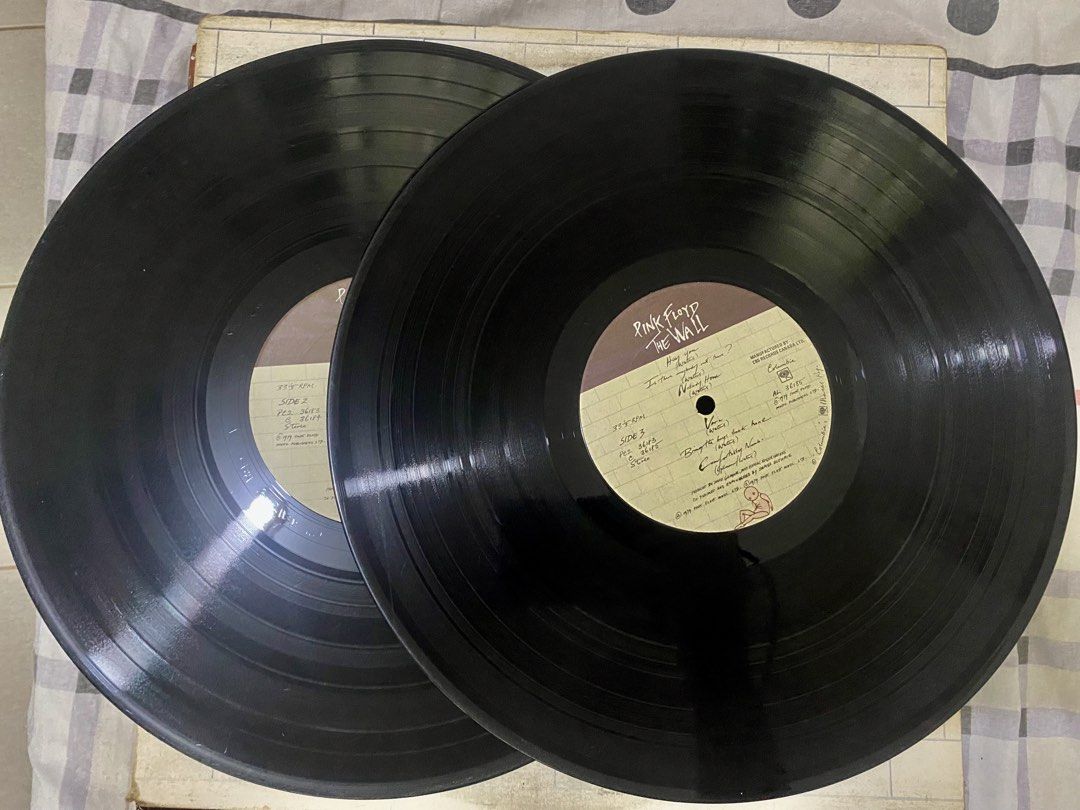 PINK FLOYD The Wall - Vinyl LP (Category: Vinyls) located in Angeles City. Submitted by lensongsong (Listing ID 1468925293, Image 2). Description: PINK FLOYD The Wall 2LP Vinyl: VG+ Cover: VG Gatefold 1979 Columbia Canada W/ lyric sheet The Wall topped the US charts for 15 weeks and reached number three in the UK. It initially received mixed reviews from critics, many of whom found it overblown and pretentious, but later received accolades as one