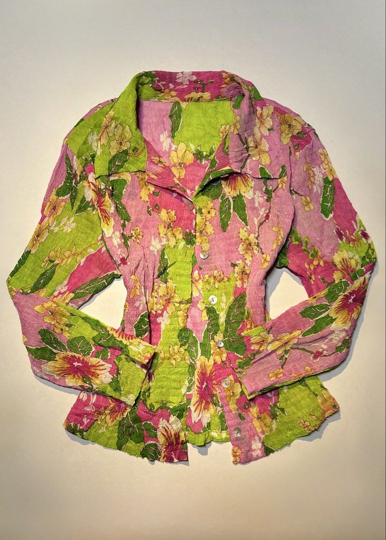 Pink Green Floral Button Down Blouse (Category: Blouses) located in Bacolod City. Submitted by thlnn_vls (Listing ID 1468884462, Image 1). Description: - Pink and green vintage-style button-down shirt - All-over floral print - Unique crinkle textured lightweight fabric - Long sleeves with a pointed collar - Perfect for effortless retro-chic looks.